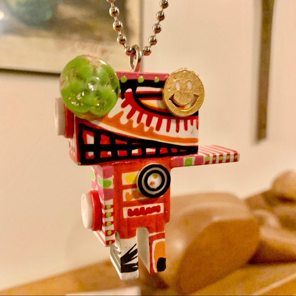 Original Artist Dibo figure necklace, $25